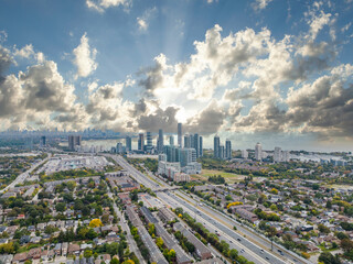 Explore the breathtaking cityscape of downtown Toronto and South Etobicoke captured through stunning drone photos in the vibrant colors of the fall season. Immerse yourself in the beauty.