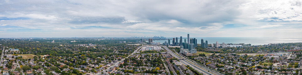 Experience the panoramic beauty of downtown Toronto and South Etobicoke in the fall season through our stunning drone photos. This Panorama view captures the essence of the city's charm and autumnal