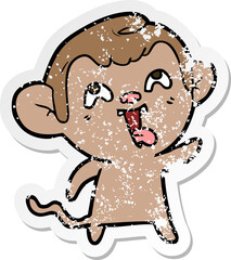 distressed sticker of a crazy cartoon monkey