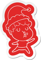 quirky cartoon  sticker of a man singing wearing santa hat