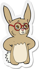 sticker of a cartoon rabbit wearing spectacles