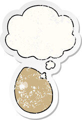 cartoon egg with thought bubble as a distressed worn sticker
