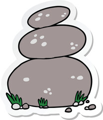 sticker of a cartoon large stacked stones