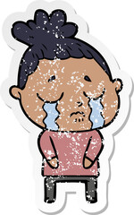 distressed sticker of a cartoon crying woman
