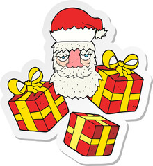 sticker of a cartoon tired santa claus face with presents