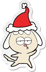 hand drawn sticker cartoon of a bored dog wearing santa hat