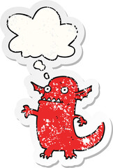 cartoon halloween monster with thought bubble as a distressed worn sticker