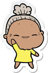 Obraz premium sticker of a cartoon peaceful old woman