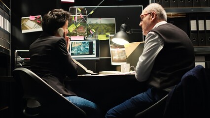 Partners running to capture criminal, receiving secret location coordinates over landline phone...