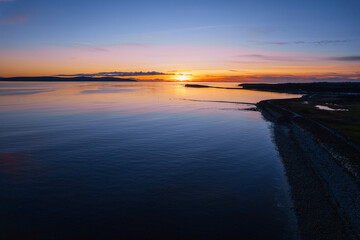 Salthill beach outline and sunset sky over Galway bay, Ireland. Aerial view. Rich saturated color.