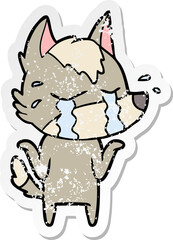 distressed sticker of a cartoon crying wolf