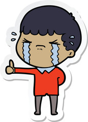 sticker of a cartoon man crying