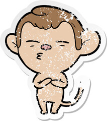 distressed sticker of a cartoon suspicious monkey