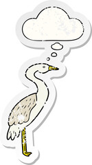 cartoon stork with thought bubble as a distressed worn sticker