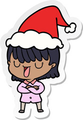 hand drawn sticker cartoon of a woman wearing santa hat
