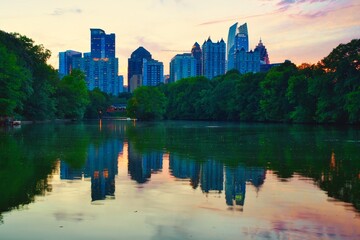 Panoramic view of Atlanta skyline during sunset with colorful sky shot from Piedmont Park in Downtown Atlanta.