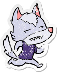 distressed sticker of a cartoon wolf showing teeth