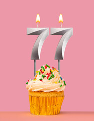 Number 77 candle with cupcake - Birthday card