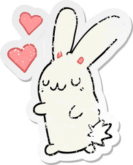 distressed sticker of a cartoon rabbit in love