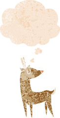 cartoon deer with thought bubble in grunge distressed retro textured style