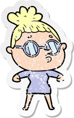 distressed sticker of a cartoon woman wearing glasses