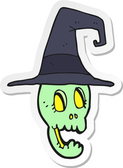 sticker of a cartoon skull wearing witch hat