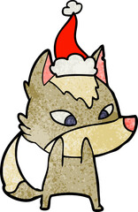 shy hand drawn textured cartoon of a wolf wearing santa hat