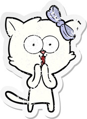 distressed sticker of a cartoon cat