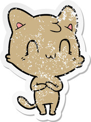distressed sticker of a cartoon happy cat