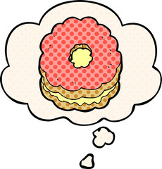 cartoon biscuit with thought bubble in comic book style