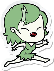 sticker of a cartoon laughing vampire girl running