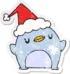 hand drawn christmas distressed sticker cartoon of kawaii penguin