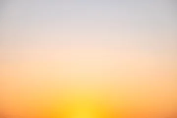Foto op Canvas Beautiful luxury soft gradient with orange gold clouds and sunlight on the blue sky perfect for the background, take in everning,morning,Twilight, high definition landscape photo © ISENGARD