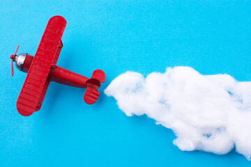 Toy airplane in sky