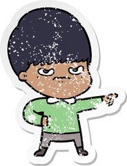 distressed sticker of a annoyed cartoon boy