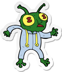 sticker of a cartoon alien spaceman