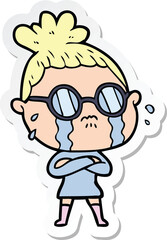 sticker of a cartoon crying woman wearing spectacles