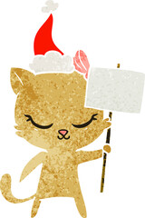 cute hand drawn retro cartoon of a cat with sign wearing santa hat
