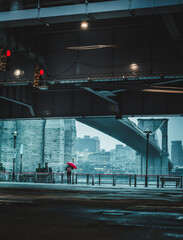 person umbrella color red views Brooklyn Bridge  New York City 