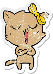 distressed sticker of a cartoon cat