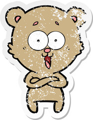 distressed sticker of a laughing teddy  bear cartoon