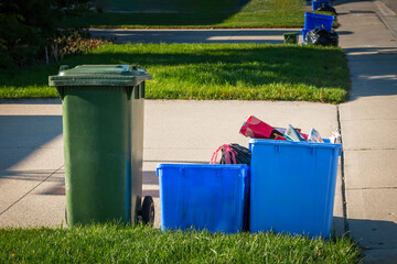 Close up of recycle and waste  bins  on roadside for pick up, waste management