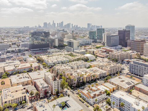 Los Angeles, California &ndash; June 3, 2023: aerial drone view toward LA Koreatown and downtown with Wilshire Blvd including bank buildings, apartments, condominiums, 6th street, Berendo at sunny day