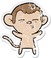 distressed sticker of a cartoon suspicious monkey