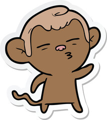 sticker of a cartoon suspicious monkey
