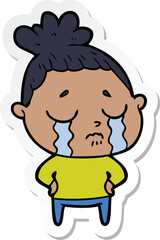 sticker of a cartoon crying woman