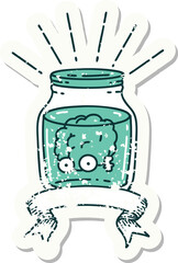 worn old sticker of a tattoo style brain in jar