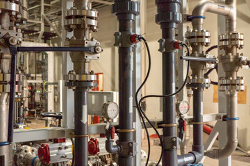 Butterfly manual Valve on the waste water pipe line. The photo is suitable to use for industry background photography, power plant poster and electricity content media.