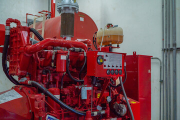 Emergency diesel and electric fire pump for power plant project. The photo is suitable to use for safety content media and fire protection background.