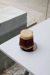 Ice coffee Espresso Tonic soda water on white table. Cold brew. Summer drinks. Homemade Refreshing Beverage.